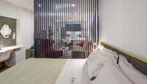 Olvios Design Suite 객실 침대
