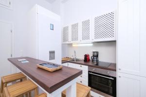 Cucina o angolo cottura di Aelia Collection Suites - Adults Friendly