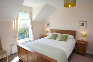 Postel nebo postele na pokoji v ubytování Killinallan Cottage