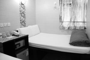 Ένα ή περισσότερα κρεβάτια σε δωμάτιο στο Russian Hostel