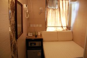 Ένα ή περισσότερα κρεβάτια σε δωμάτιο στο Russian Hostel
