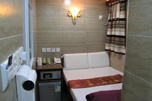 Ένα ή περισσότερα κρεβάτια σε δωμάτιο στο Russian Hostel