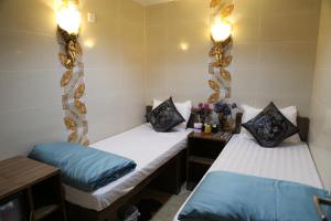 Ένα ή περισσότερα κρεβάτια σε δωμάτιο στο Russian Hostel