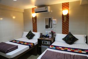 Ένα ή περισσότερα κρεβάτια σε δωμάτιο στο Russian Hostel