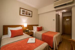 Cama ou camas em um quarto em Hotel Solans Carlton