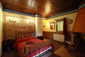 Postel nebo postele na pokoji v ubytování Hotel Nemesis