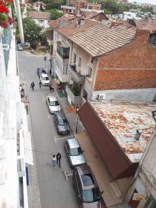 an overhead view of a street with cars parked in a city at Thomas Palace Apartments in Sandanski