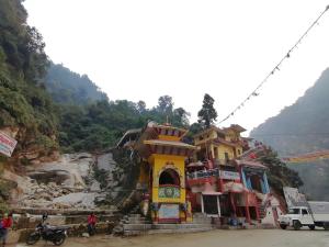 a small temple on the side of a mountain at Madhukunda Homestay in Butwāl