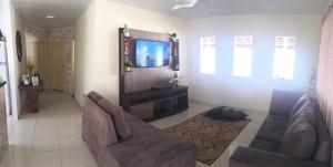 Posezení v ubytování Casa para temporada c/ ar condicionado