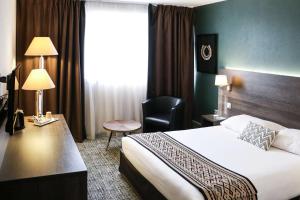 Voodi või voodid majutusasutuse Best Western Plus Hotel Admiral toas