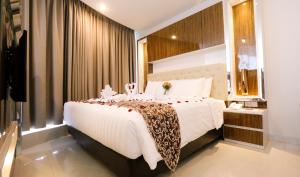 Katil atau katil-katil dalam bilik di Hotel Daily Inn