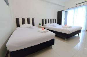 Un pat sau paturi într-o cameră la sk resort