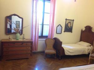 Postel nebo postele na pokoji v ubytování Villa Rosi