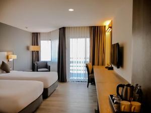 Katil atau katil-katil dalam bilik di Fortune View Khong Hotel Nakhon Phanom