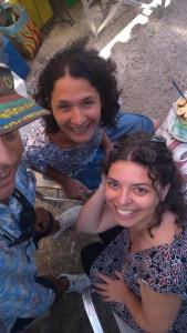 a group of three women posing for a picture at Manos STUDIOS & APARTMENTS in Skopelos Town