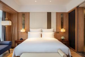 Katil atau katil-katil dalam bilik di Pullman Changbaishan Resort