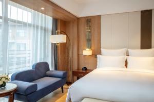 Katil atau katil-katil dalam bilik di Pullman Changbaishan Resort