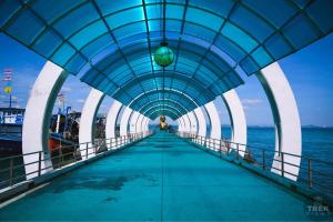 a walkway over the water on a pier at Samed Port View in Ko Samed +108 photos