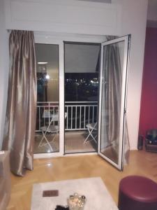 Balkón nebo terasa v ubytování ATHENS RIVIERA SEA VIEW APARTMENT