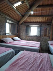Letto o letti in una camera di Chin -Be Village Cafe & Homestay
