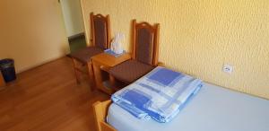 Llit o llits en una habitació de Hostel AV Palanka