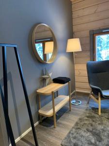 TV a/nebo společenská místnost v ubytování Levi Black Apartments