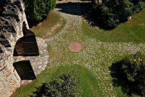 an overhead view of a stone walkway in a yard at Hotel Nemesis in Stavroupoli