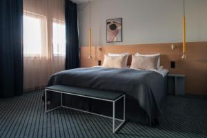 Letto o letti in una camera di Quality Hotel Globe