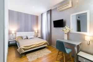 Llit o llits en una habitació de Garni Hotel Mediteraneo