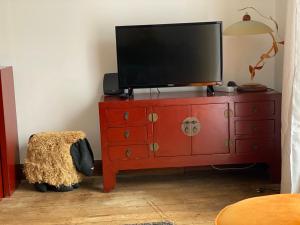 Et tv og/eller underholdning på Gîte 90m2, grande terrasse, 3 chambres Mondelange