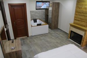 TV a/nebo společenská místnost v ubytování Beach Butik Hotel Şile