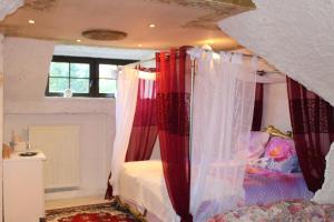 Cama ou camas em um quarto em Monteurzimmer Ausma Boen 1 - Vakantiewoning Villa De Gouden Droom