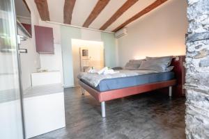 Voodi või voodid majutusasutuse Albergo Porta Verzasca toas