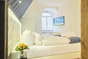 Ein Bett oder Betten in einem Zimmer der Unterkunft Sonnenresort Ettershaus