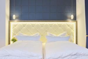 Ein Bett oder Betten in einem Zimmer der Unterkunft Sonnenresort Ettershaus
