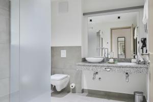 Ein Badezimmer in der Unterkunft Sonnenresort Ettershaus