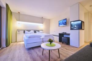 Ein Bett oder Betten in einem Zimmer der Unterkunft Sonnenresort Ettershaus