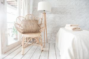 Postel nebo postele na pokoji v ubytování Dreamsea Bali