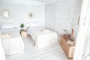 Postel nebo postele na pokoji v ubytování Dreamsea Bali
