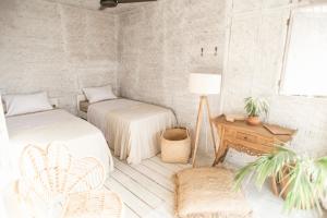 Postel nebo postele na pokoji v ubytování Dreamsea Bali