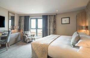 Cama ou camas em um quarto em Boulevard Hotel