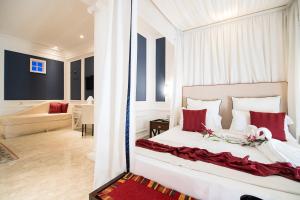 Postel nebo postele na pokoji v ubytování Hotel Baglio Basile