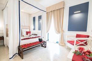 Postel nebo postele na pokoji v ubytování Hotel Baglio Basile