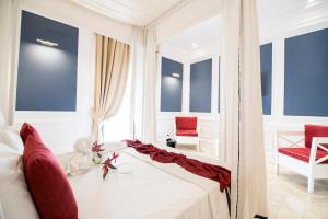 Postel nebo postele na pokoji v ubytování Hotel Baglio Basile