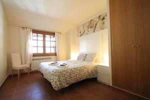 Llit o llits en una habitació de Ensagents, Canillo centro, Zona Grandvalira