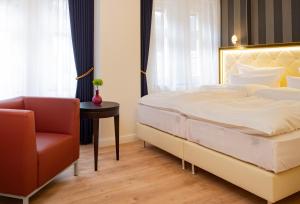 Ein Bett oder Betten in einem Zimmer der Unterkunft Sonnenresort Ettershaus