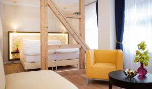 Ein Bett oder Betten in einem Zimmer der Unterkunft Sonnenresort Ettershaus