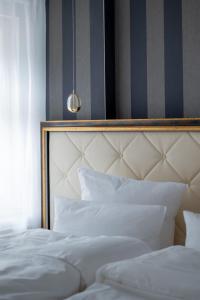 Ein Bett oder Betten in einem Zimmer der Unterkunft Sonnenresort Ettershaus