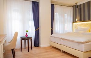 Ein Bett oder Betten in einem Zimmer der Unterkunft Sonnenresort Ettershaus