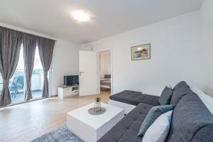 TV a/nebo společenská místnost v ubytování Star 2 modern & centrally ap for 6